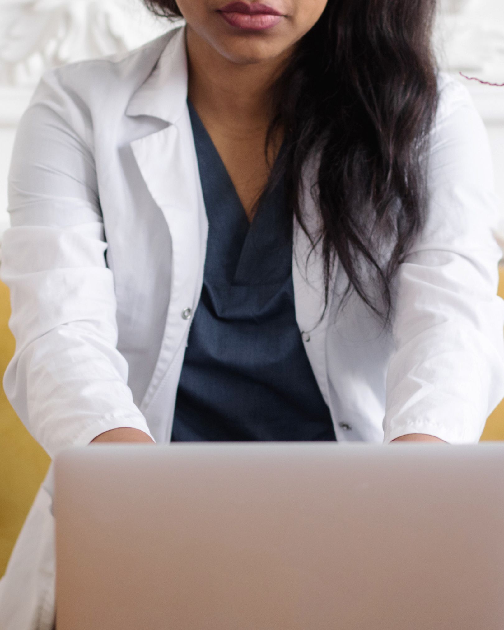 A licensed clinician reviewing assessments